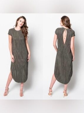 Sabina Musayev Anthropologie
Midi dress green size XS petite.